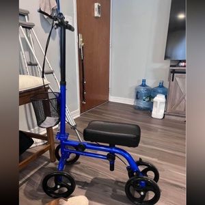 Scooter and 2 sets of crutches